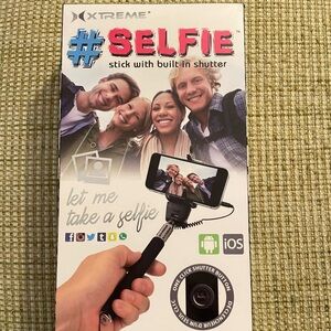 Black Selfie Stick with Built-in Shutter. For use with all smartphones